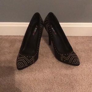 Black heels with gold studs